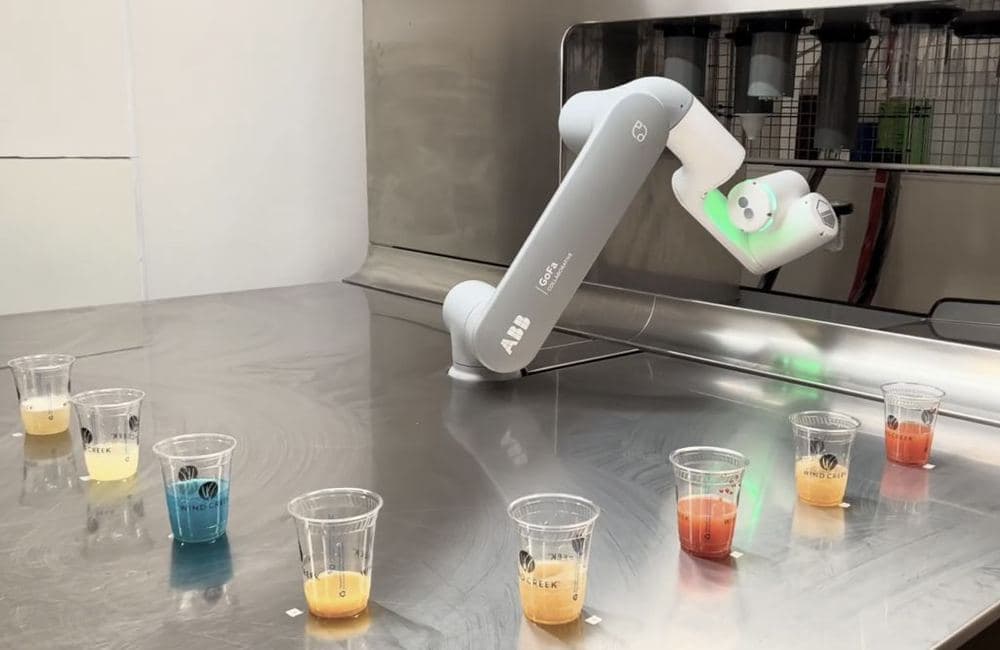 Toni robotic arm serving drinks